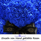 Blauer Rosenbär mit schwarzer Schleife - ROSEBEAR NADIR